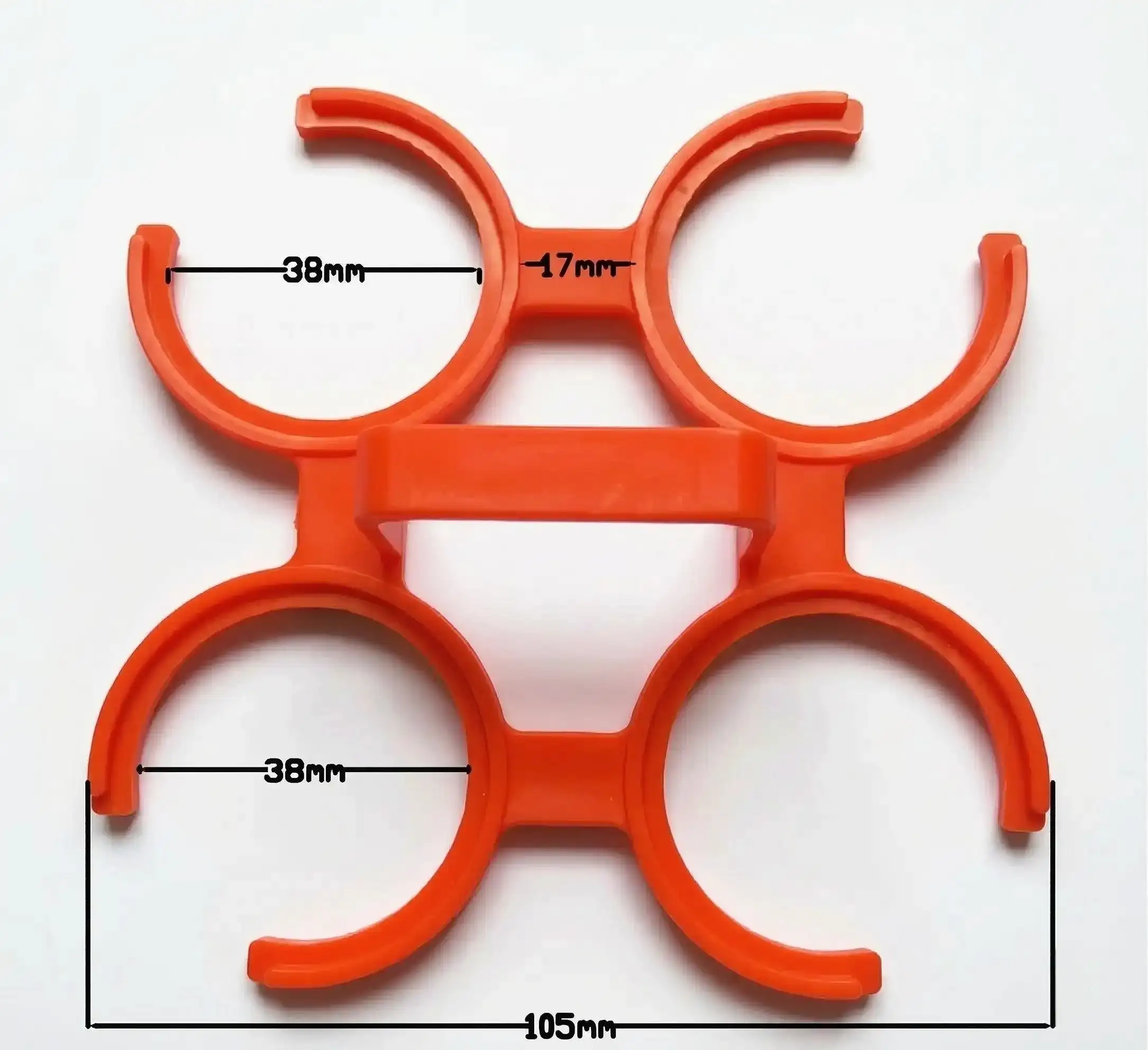 Demonstration of easily removing a single water bottle from the 4-pack plastic ring carrier.